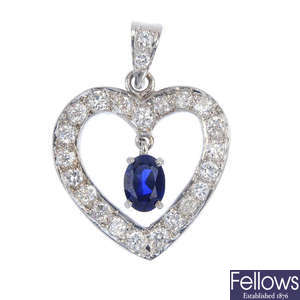 A sapphire and diamond heart pendant.