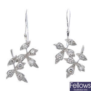 A pair of 18ct gold diamond foliate ear pendants.