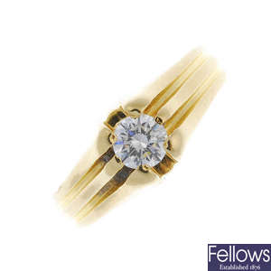 A gentleman's diamond single-stone ring. 