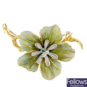 An 18ct gold diamond, emerald and enamel flower brooch.