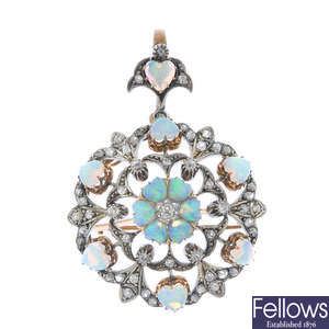 A late 19th century silver and gold opal and diamond pendant. 