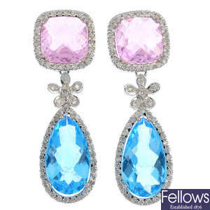 A pair of diamond and paste pendants.