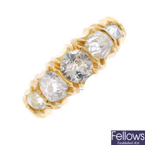 An Edwardian diamond five-stone ring.