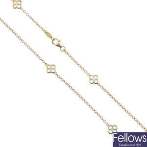 HEIDI KLUM - a diamond floral necklace.