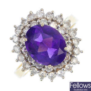 An 18ct gold amethyst and diamond cluster ring.