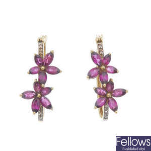 A pair of 9ct gold garnet and diamond floral earrings.