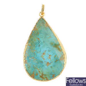 A turquoise pendant.