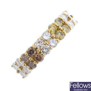 An 18ct gold diamond and coloured treated 'brown and 'yellow' diamond half-circle eternity ring.
