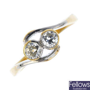 A mid 20th century 18ct gold diamond two-stone crossover ring. 