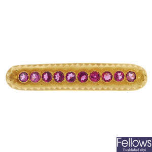 A late 19th century continental 18ct gold garnet brooch.