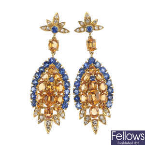 A pair of citrine, sapphire, and diamond ear pendants.