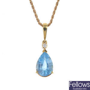 An 18ct gold topaz and diamond pendant, with 9ct gold chain. 