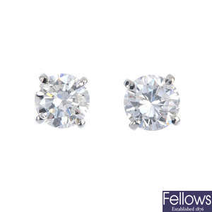 A pair of 18ct gold brilliant-cut diamond single-stone ear studs.
