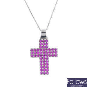 A sapphire cross pendant, with chain.