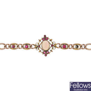 An early 20th century 9ct gold opal and ruby bracelet. 