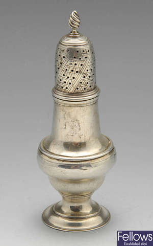 A George III silver caster of baluster form.