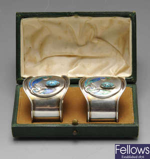 A pair of Edwardian silver napkin rings by William Hair Haseler for Liberty & Co.
