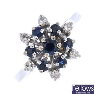 A sapphire and diamond star cluster ring.