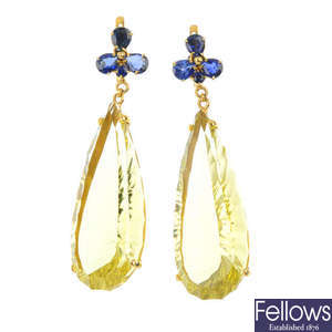 A pair of citrine and sapphire ear pendants. 