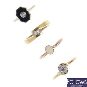 A selection of four diamond and gem-set rings.