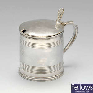 A George III provincial silver mustard pot of tankard form.
