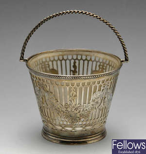A Victorian silver sugar basket.