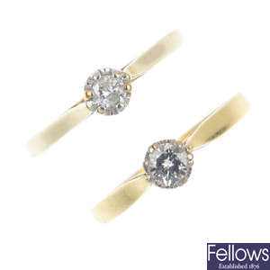 Two 9ct gold diamond single-stone rings. 
