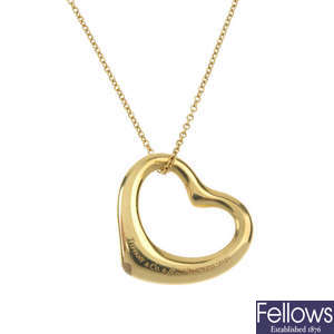 TIFFANY & CO. - an 18ct gold 'Open Heart' pendant, by Elsa Peretti for Tiffany & Co. 