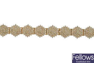 An 18ct gold diamond cluster bracelet.