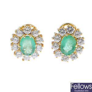 A pair of 18ct gold emerald and cubic zirconia cluster ear studs.