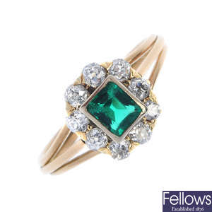 A synthetic emerald and diamond cluster ring.