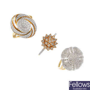 A selection of three 9ct gold diamond dress rings.