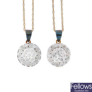 Two 9ct gold diamond pendants.
