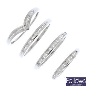 A selection of four 9ct gold diamond rings. 
