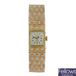 CASTLE - a lady's 9ct yellow gold bracelet watch.