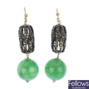 A pair of jade and diamond ear pendants. 