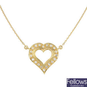 A diamond heart pendant mount, on chain.