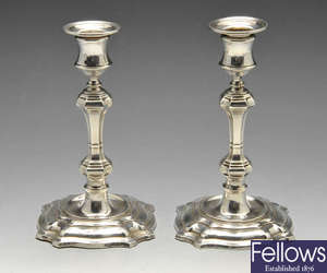 A pair of early 20th century candlesticks in Georgian style.