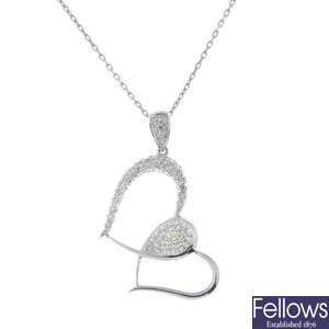 An 18ct gold diamond heart pendant.