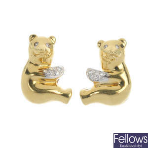 A pair of diamond bear ear studs.