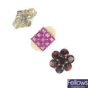 A selection of three gem-set dress rings.