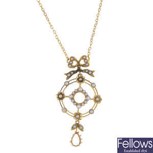 An early 20th century 15ct gold split pearl pendant. 