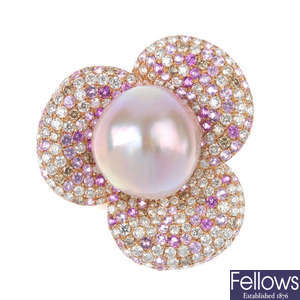 A South Sea cultured pearl, diamond and sapphire floral dress ring. 