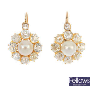 A pair of late 19th century gold cultured pearl and diamond ear pendants.