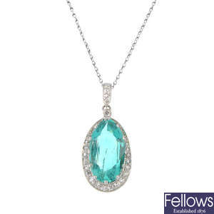 A Columbian emerald and diamond pendant.