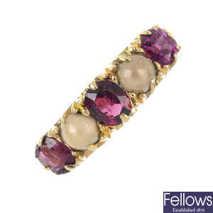 A late Victorian 18ct gold garnet and split pearl five-stone ring