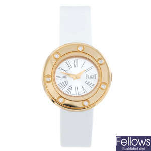 PIAGET - a lady's 18ct rose gold Possession wrist watch.
