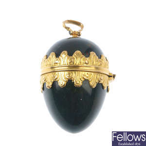 A late 19th century hinged bloodstone and gold pendant.