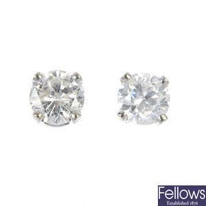 A pair of 18ct gold diamond single-stone ear studs.