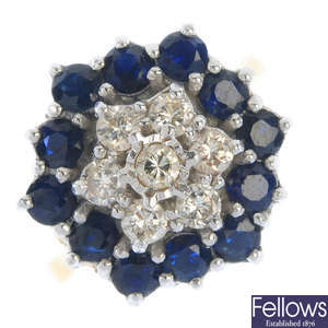 An 18ct gold diamond and sapphire cluster ring.